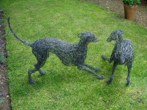 Playing Whippet Dogs, life size, painted wire.
